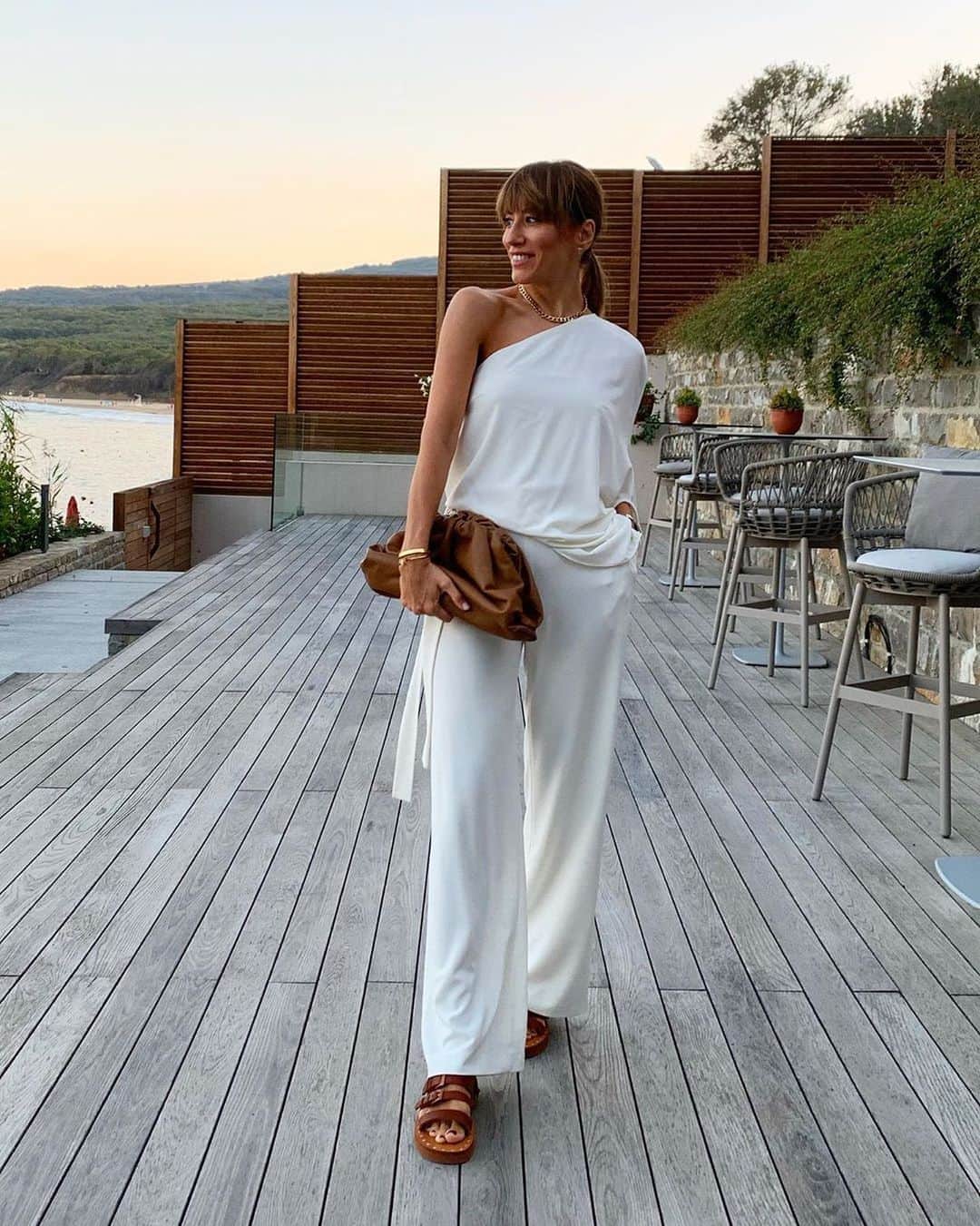 ホルストンのインスタグラム：「@inmystyle out and about in our One Shoulder Jumpsuit. ⠀ ⁠⠀ #halston」