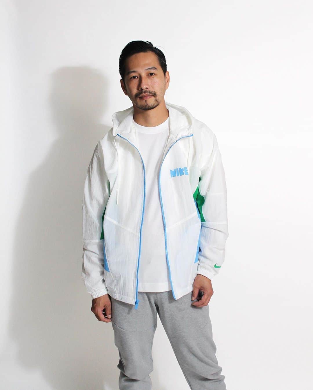 A+Sのインスタグラム：「in stock now  ■NIKE WINDRUNNER WOVEN NB JKT COLOR : SAIL, ROYAL, RED SIZE : SMALL - 2X LARGE PRICE : ¥11,000 (+TAX)  MODEL : L size(174cm)  過去にリリースされたアーカイブよりインスピレーションを得て、現代に蘇ったウーヴンジャケット。袖幅をたっぷりととり、ライニングはメッシュを用い動きやすさと快適な着心地を実現。フロントロゴはマニアにはたまらないヴィンテージロゴ配置し、配色もレトロ感溢れる一着に仕上がっています。  A woven jacket that has been revived in modern times, inspired by archives released in the past. Plenty of sleeve width and mesh lining for ease of movement and comfort. The front logo is a flocky print with a Kamaboko logo that is irresistible to enthusiasts, and the color scheme is also finished in a retro style.  #NIKE #NIKEWRWVNJKT #NIKEWINDRUNNER #NIKEWOVENJACKET #NIKEWINDRUNNERWOVENJACKET」