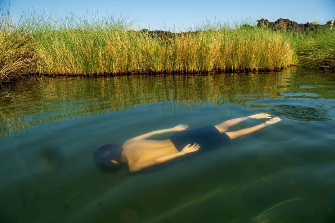 National Geographic Travelさんのインスタグラム写真 - (National Geographic TravelInstagram)「Photo by @amivitale / Much of northern Kenya is arid country under the equatorial sun, and sometimes there is not a drop of rain for months or even years. The landscapes vary from craggy, volcanic fields to impassable areas of dune systems. Sometimes, in the middle of it all, there are hidden gems like this—a water hole surrounded by old lava—and it makes your heart stop.  Follow @amivitale for more stories about the beauty and hope in the world. @thephotosociety @natgeo #kenya #magicalkenya #wateringhole #swimming #africa」9月26日 17時09分 - natgeotravel