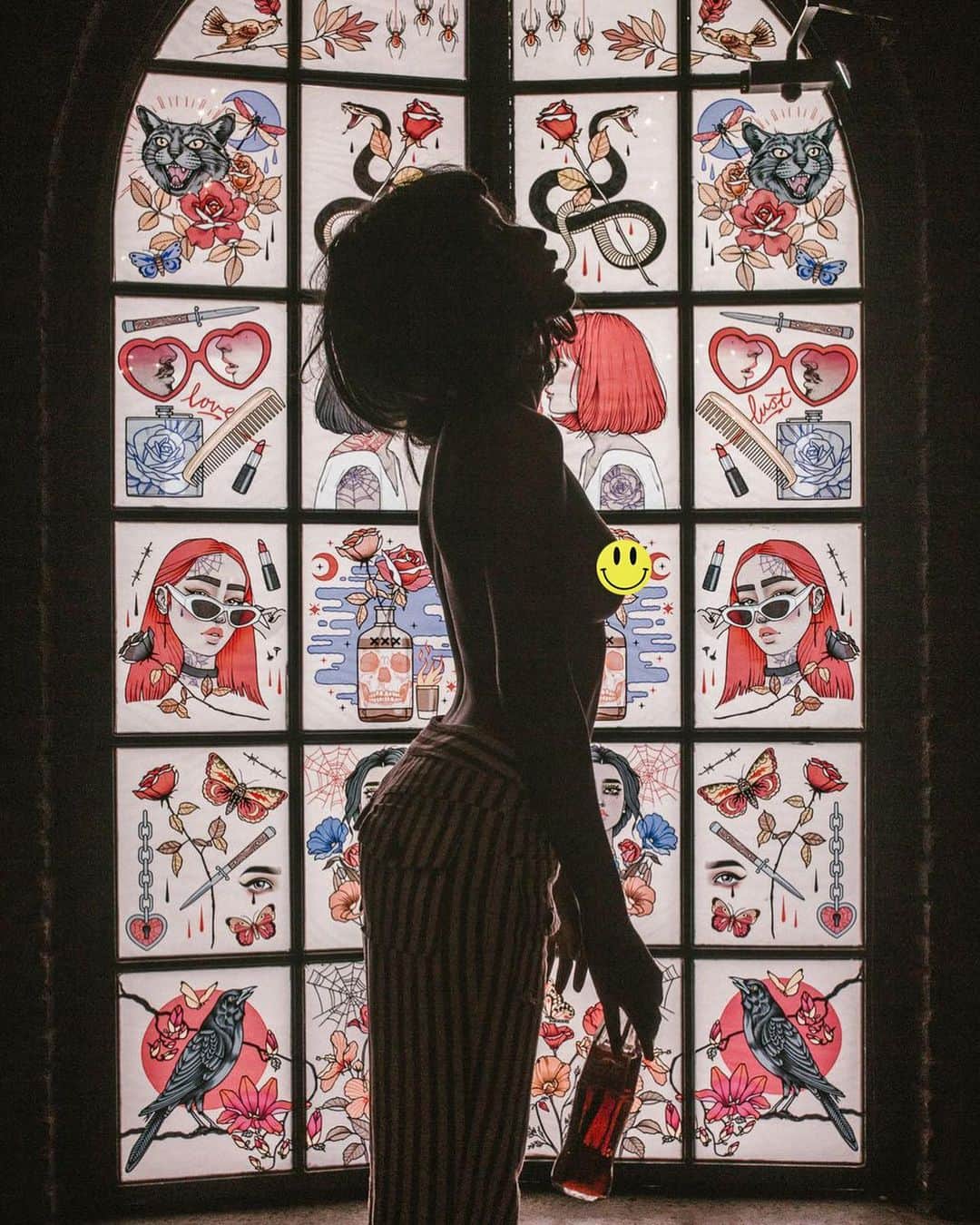 Rik Leeのインスタグラム：「A couple of years ago I made a series of illustrations for this stained-glass style window in Kuro Neko Bar, Bali. I’m pretty stoked with how this came together. It’s always weird having a drink there and watching people take photos in front of it (especially if they’re topless 😂)  . Swipe to get a better look at a few of the illustrated panels and let me know your favorite one - venom, poison, love or lust?  . #riklee #illustration #art #design #interiordesign #bali #kuroneko #window #tattoo」
