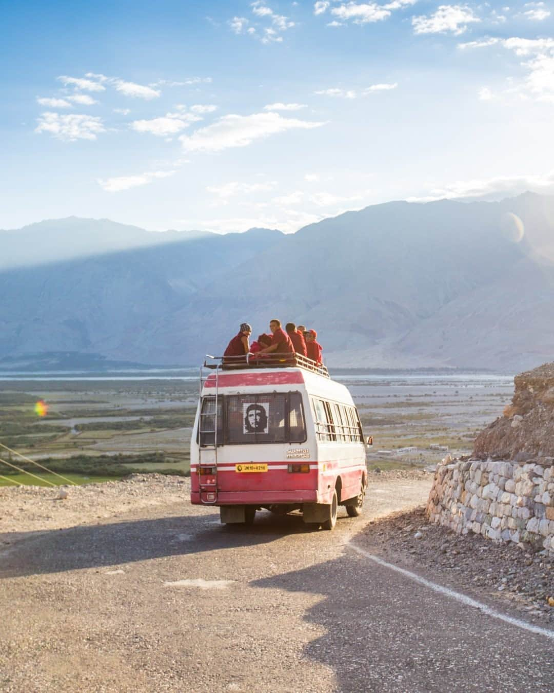 National Geographic Travelさんのインスタグラム写真 - (National Geographic TravelInstagram)「Photo by @emilypolar / A bus with character shuttles monks from Diskit Monastery down the hill to the valley floor of Nubra in Ladakh. To see more of the magnificence in the mundane, follow me @emilypolar.」9月26日 21時07分 - natgeotravel