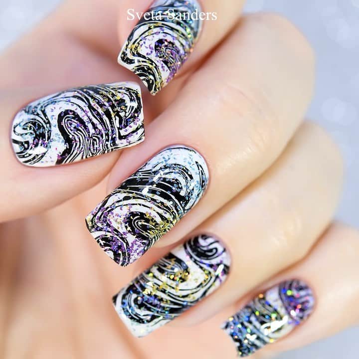 Sveta Sandersのインスタグラム：「Coloured Holographic Top Coats by @holotaco + stamping plate B059 by @whatsupnails」