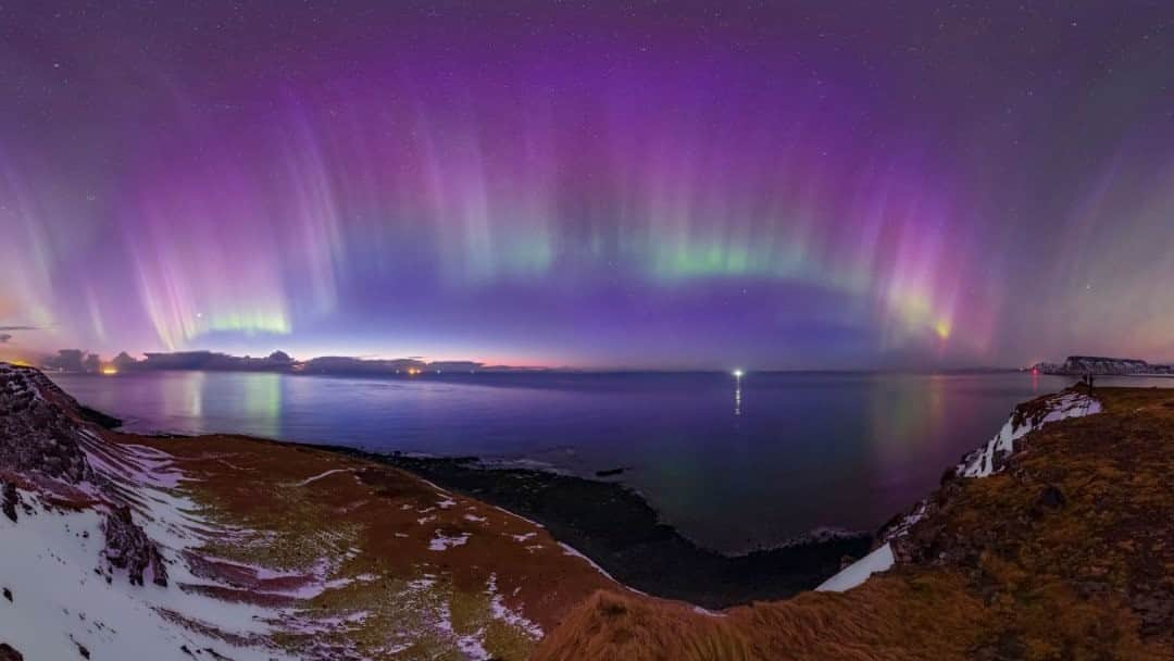 National Geographic Travelさんのインスタグラム写真 - (National Geographic TravelInstagram)「Photo by @babaktafreshi / The northern lights dressed in pastels soon after sunset in bright twilight above the west coast of Iceland. This panoramic view of a very strong, colorful aurora display was taken in March 2015. Experience this view in virtual reality on my website at babaktafreshi.com/vr and explore more @babaktafreshi. #aurora #iceland #twanight #northernlights」9月27日 13時09分 - natgeotravel