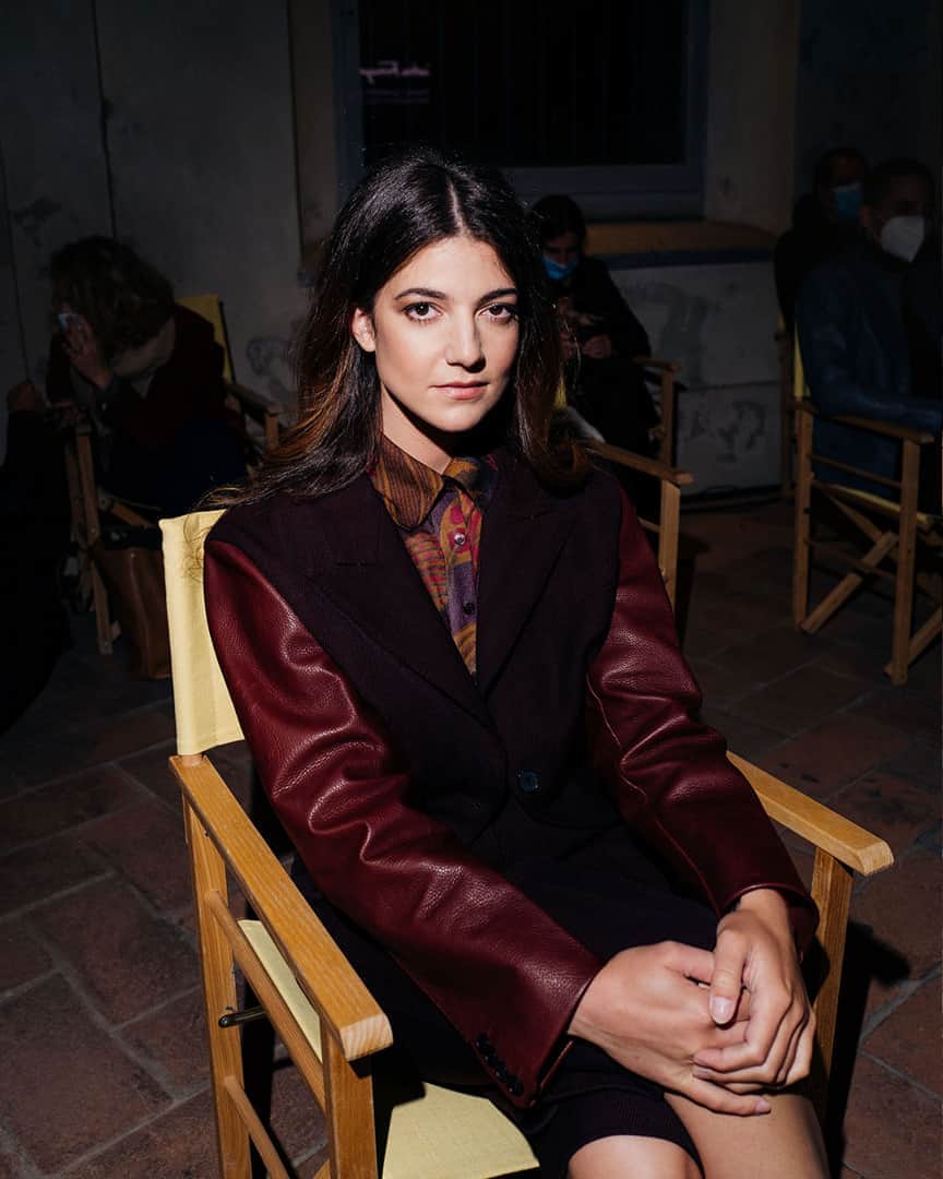 のインスタグラム：「The Salvatore Ferragamo Spring/Summer 2021 fashion show, opened by a short film by Director Luca Guadagnino, was attended by actress Esther Garrel of Call Me By Your Name, pictured here in a short Nebbiolo herringbone jacket and culottes ensemble. #FerragamoSS21」