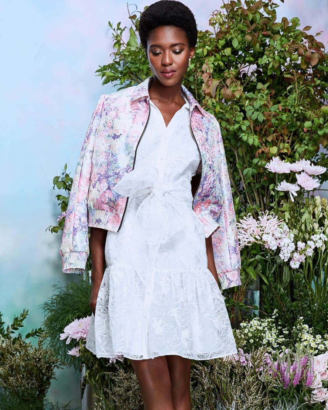 Marchesaさんのインスタグラム写真 - (MarchesaInstagram)「Look 12 from the Spring 2021 Marchesa Notte Daywear collection features a printed jacquard bomber jacket paired with a short sleeve organza shirt dress. #marchesa #marchesanotte #nyfw #NYFWgoescommando #wearcommando  ⠀ Photographer: @haifaphotography  Model: @realalimalaf  Retouching: @massiveface_post  Hair: @mrtnplascencia  Makeup: @sarah_fiorello  Florals: @r.c.inc  Undergarments: @wearcommando」9月27日 23時57分 - marchesafashion