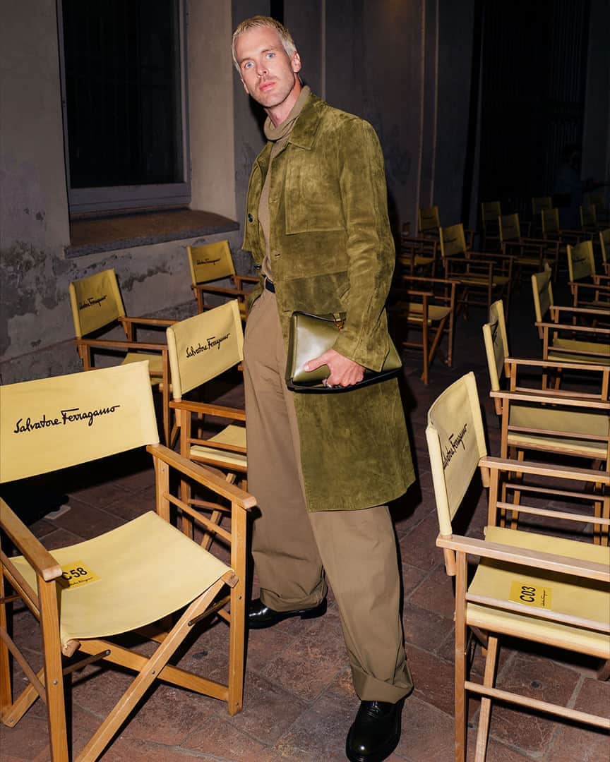 サルヴァトーレ・フェラガモのインスタグラム：「Chris Burt-Allan is impeccably styled in a sumptuous suede trench ensemble at the Salvatore Ferragamo Spring/Summer 2021 show. #FerragamoSS21」