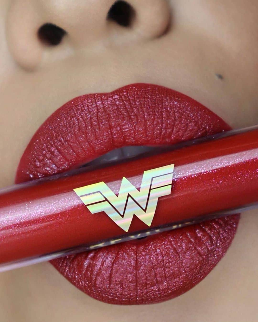 Revlonさんのインスタグラム写真 - (RevlonInstagram)「Our mysterious, ultra-pigmented #RevlonxWW84 Warrior Glitter Lip Color has a secret only you can unlock: Swipe on the gloss, then press your lips together to let the multidimensional glitter finish shine through 💋  @makeupbyflavia_ is wearing shade Fight For It (001)」9月28日 5時16分 - revlon