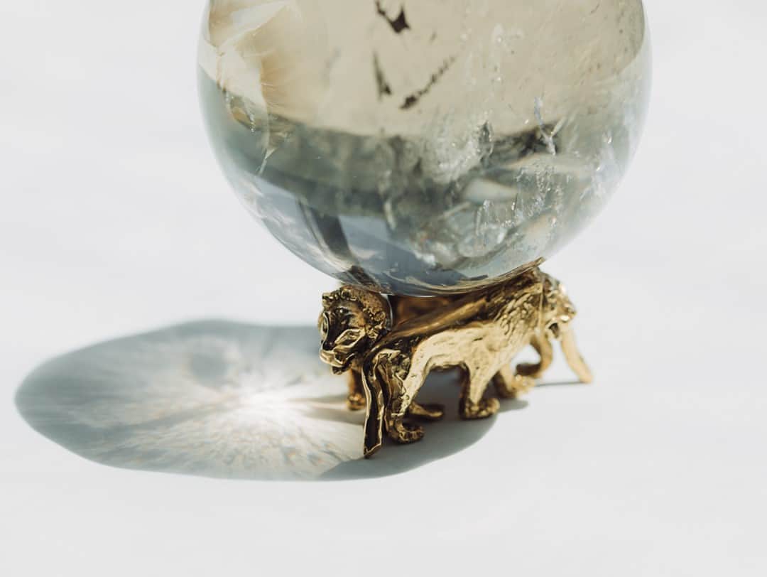 グーセンス パリのインスタグラム：「A smaller version of the trio of lions in gilded bronze holding a rock crystal globe originally made for Gabrielle Chanel.」