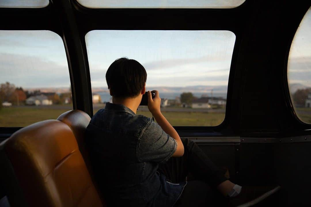 National Geographic Travelさんのインスタグラム写真 - (National Geographic TravelInstagram)「Photos by @MichaelGeorge / October 2019, 5:30 a.m. The river is so faint it might be a mirage. I am one of three people half awake in the observation car. The smell of instant coffee grows in strength from down below as the forest around us reveals itself. The blues and blacks become fireworks of orange and yellow. Many more people arrive as the sun does as well. We begin taking shifts, allowing new people to sit down and enjoy the view. You try not to linger too long, though all you want to do is press your face to the glass and slip into a daydream. These are scenes on the VIA Rail from Montreal to Halifax.  For more photos and writing from my travels, follow along @MichaelGeorge. #viarail #newbrunswick #traintravel #montreal #halifax」9月29日 5時06分 - natgeotravel