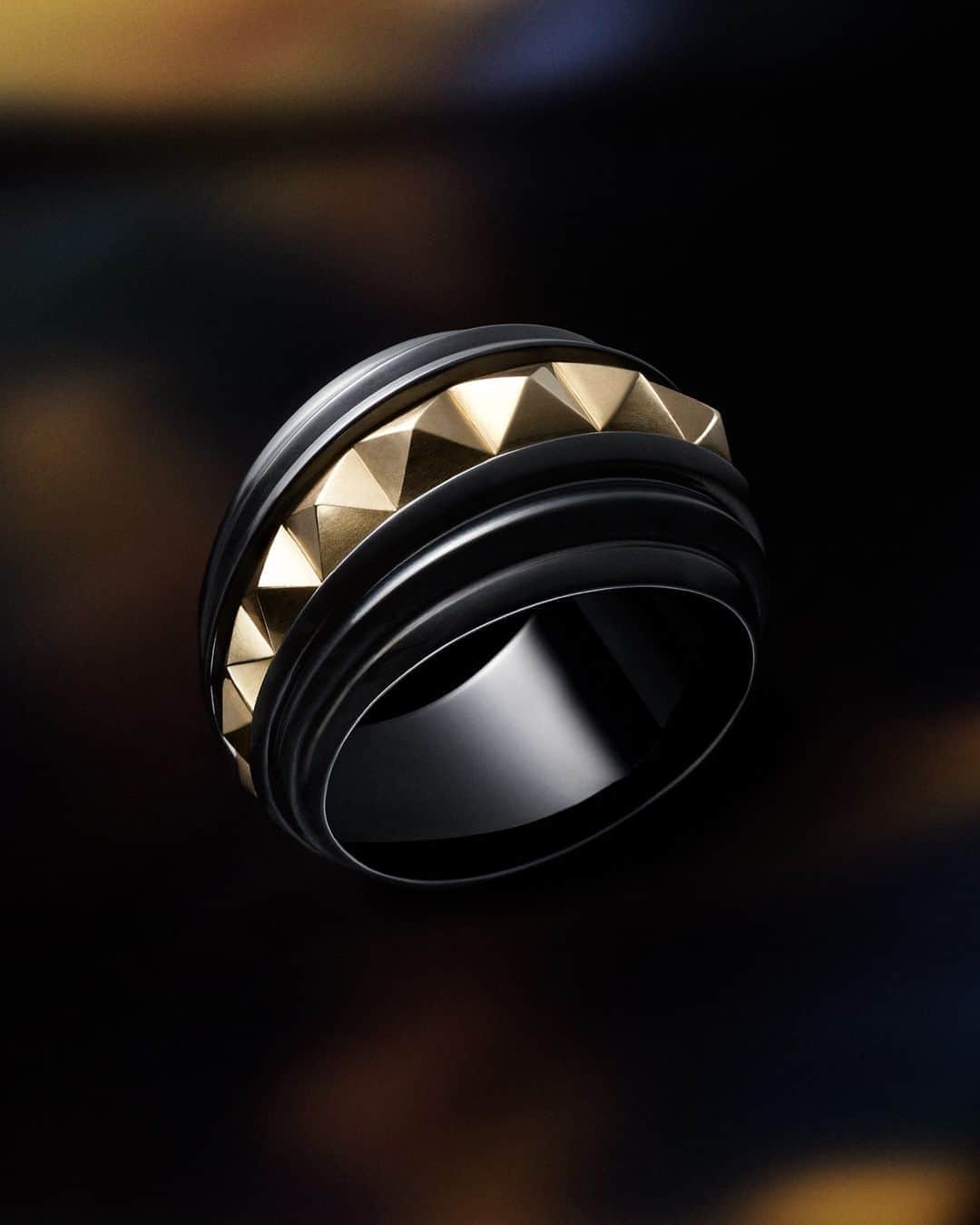 デビッドヤーマンのインスタグラム：「Introducing the #DavidYurman Pyramid Collection. The ancient pyramid meets modern style in this 18K gold ring with black titanium. See more of the collection via our bio link.」