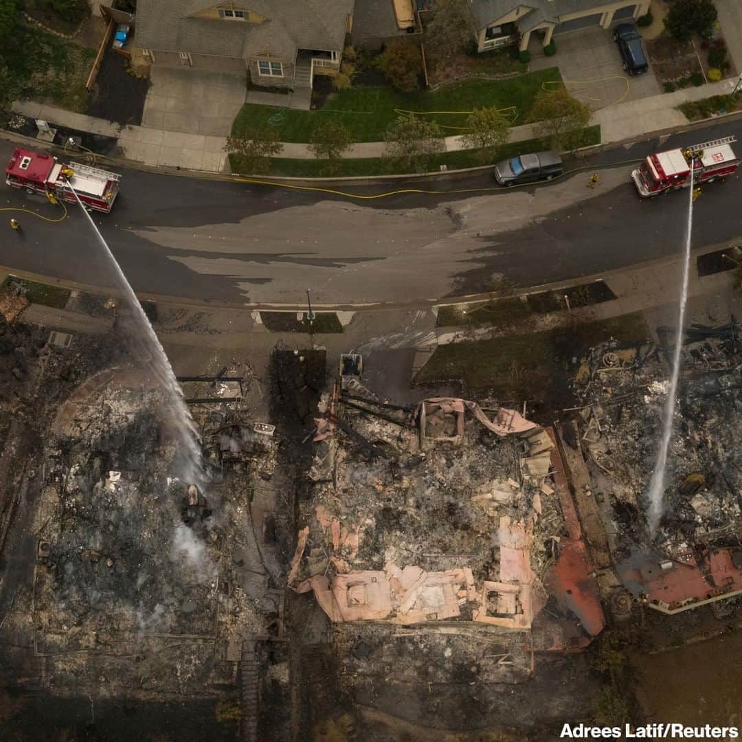 ABC Newsさんのインスタグラム写真 - (ABC NewsInstagram)「Firefighters extinguish homes destroyed by the Shady Fire after it advanced into the Skyhawk neighborhood of Santa Rosa, California, about 60 miles north of San Francisco. More than 18,000 firefighters remain on the front lines to combat at least 27 wildfires across the state, officials said.」9月29日 13時54分 - abcnews