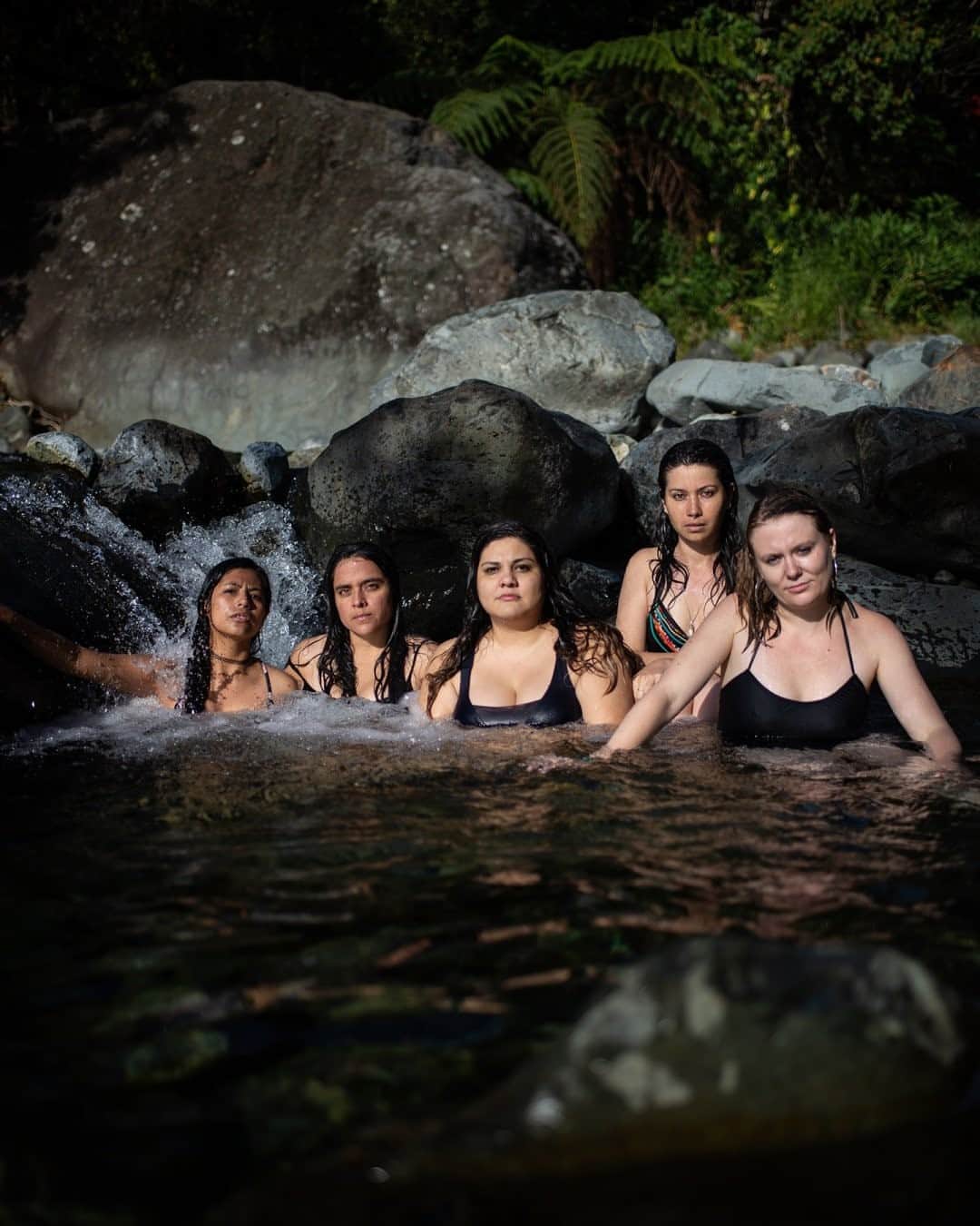 National Geographic Travelさんのインスタグラム写真 - (National Geographic TravelInstagram)「Photo by Luján Agusti @lujanag / Friends pose for a portrait on the Pance River in Cali, Colombia. The Pance River flows along the southern side of Cali city and is a popular place for recreation and leisure activities. It is one of the few rivers in the city that is not polluted and where people can still swim. Follow me @lujanag to learn more about my work.」9月30日 9時05分 - natgeotravel
