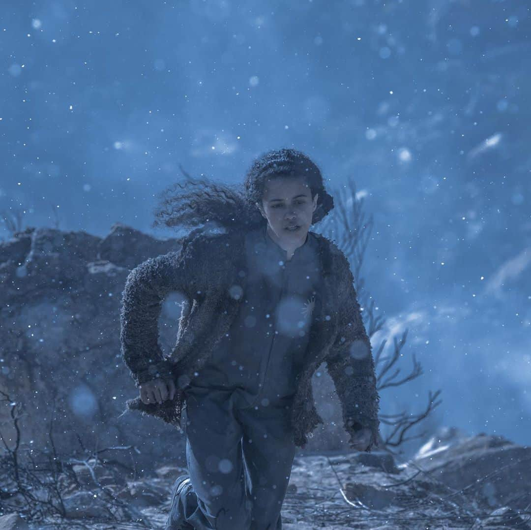 ジョーダン・ロクランのインスタグラム：「@raisedwolvesmax  finale tomorrow! [Image description: Tempest is running across a rocky landscape, snow lightly falling around her.] #RaisedByWolvesMax#HBOMax」