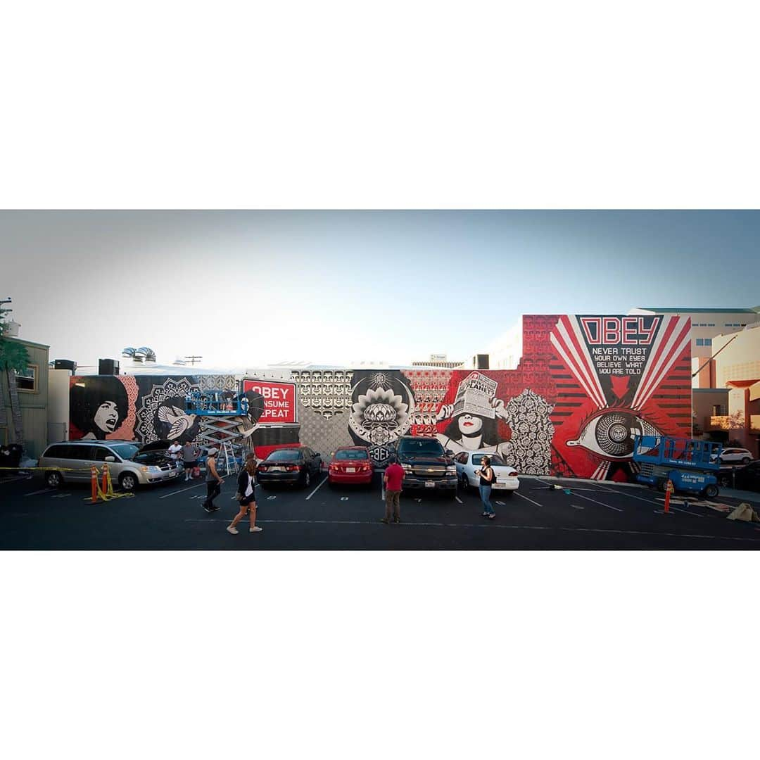 Shepard Faireyさんのインスタグラム写真 - (Shepard FaireyInstagram)「The crew and I went down to San Diego in 2010 to work on some murals and attend the "Viva La Revolucion" show at the Museum of Contemporary Art San Diego. I painted the Burmese Monk at 30 feet high with my team, and we also did a huge mural on 5th in Hillcrest, and a couple stenciled large icons around SD. It was a nice way to return to San Diego after dealing with a fair amount of police harassment when I lived there from '96-'01. Almost all the artists in the show did outdoor works, which was a big deal for the very clean and conservative city of San Diego. Of course, the younger crowd, which the city seemed to ignore at the time, was enthusiastically supportive and showed up to the museum opening in record numbers. Hopefully, the city recognized the positive impact a show like this made upon the creative community and community at large—photos by Geoff Hargadon. -Shepard  #throwback #tbt #sandiego #obey #obeygiant #shepardfairey」10月2日 2時35分 - obeygiant