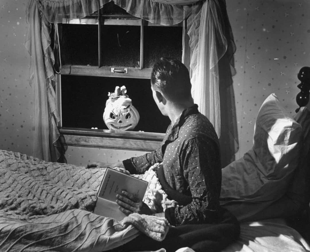 lifeのインスタグラム：「A small pumpkin-headed creature peers through a bedroom window. Come with LIFE to a vintage Halloween party by clicking the link in bio... (William Shrout, 1941/LIFE Picture Collection)   #spooky #pumpkinhead #1940svintage #halloweeninspo #zionsvilleindiana」