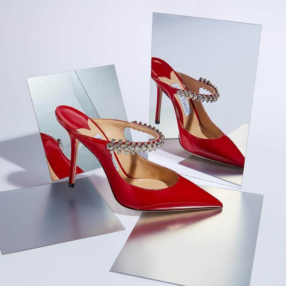 Saks Fifth Avenueのインスタグラム：「Let's get straight to the point: @jimmychoo’s coveted patent leather mules are guaranteed to add some bling to your everyday. #10022SHOE」