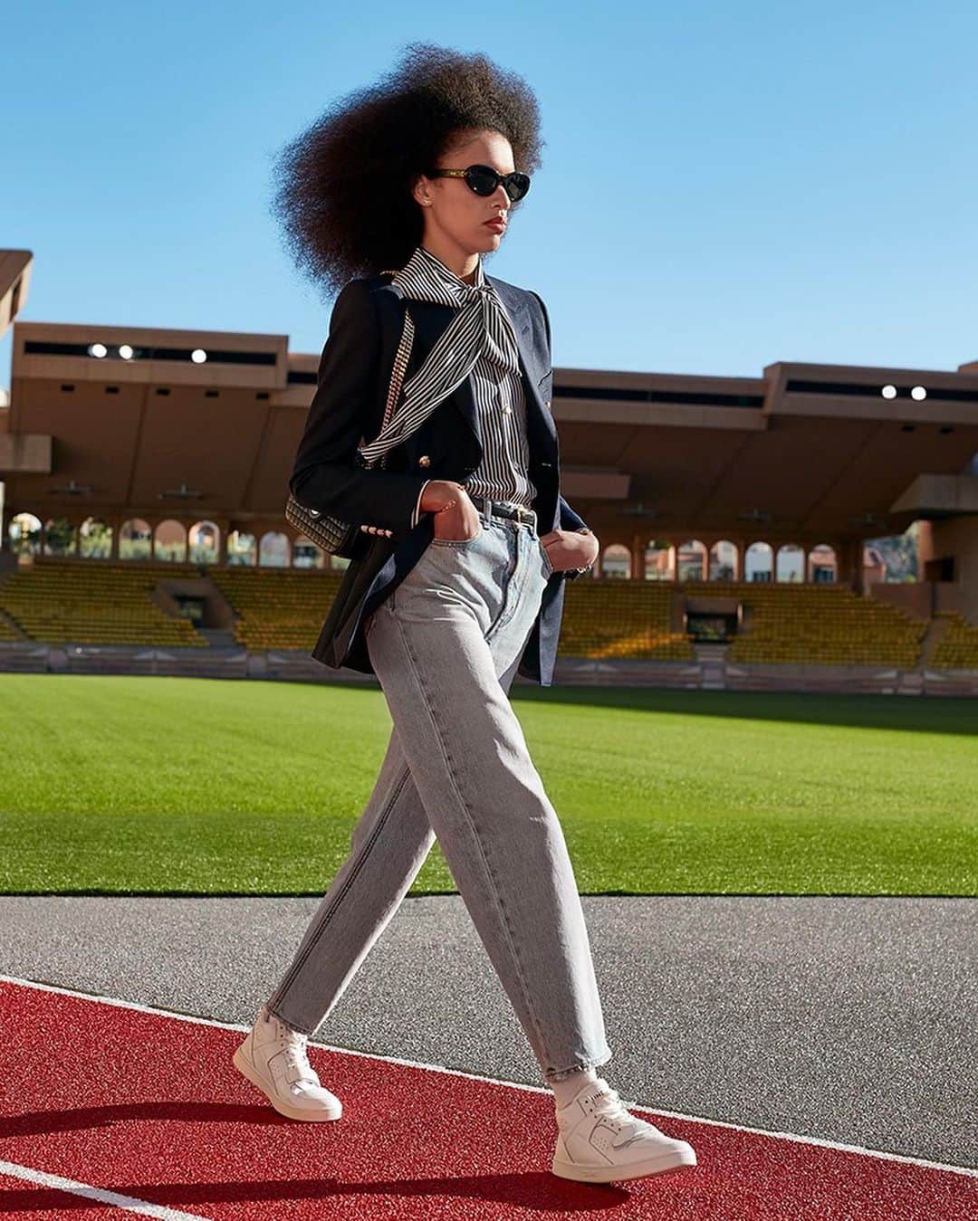 Vogue Parisさんのインスタグラム写真 - (Vogue ParisInstagram)「A new @celine woman walked the runway today in Monaco behind the closed doors of the open air Louis II stadium. The signature Parisian elegance was given an air of nonchalance and a sportswear edge this season for an athletic couture wardrobe: hoodies and tracksuits were printed with links while dresses (which were longer than usual) were worn with white sneakers, and Nineties-style jeans were paired with silk draped crop tops and caps. It was a statement of adolescent chic summed up in the press release as ‘20 in 2020’. #celine」10月27日 6時16分 - voguefrance