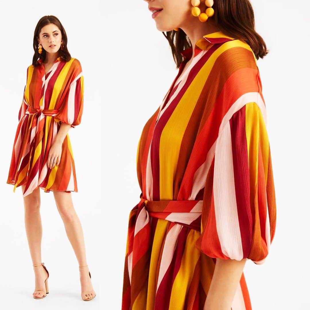 サッチン+バビのインスタグラム：「Just what we want to wear right now...The Ilanna mini dress with drop shoulder, elbow-length balloon sleeves in crinkle georgette featured in our sunset stripe with a self- belt at the waist, and swingy hem. #sachinandbabi, #dresses, #fashion, #seasonless, #fallfashion」