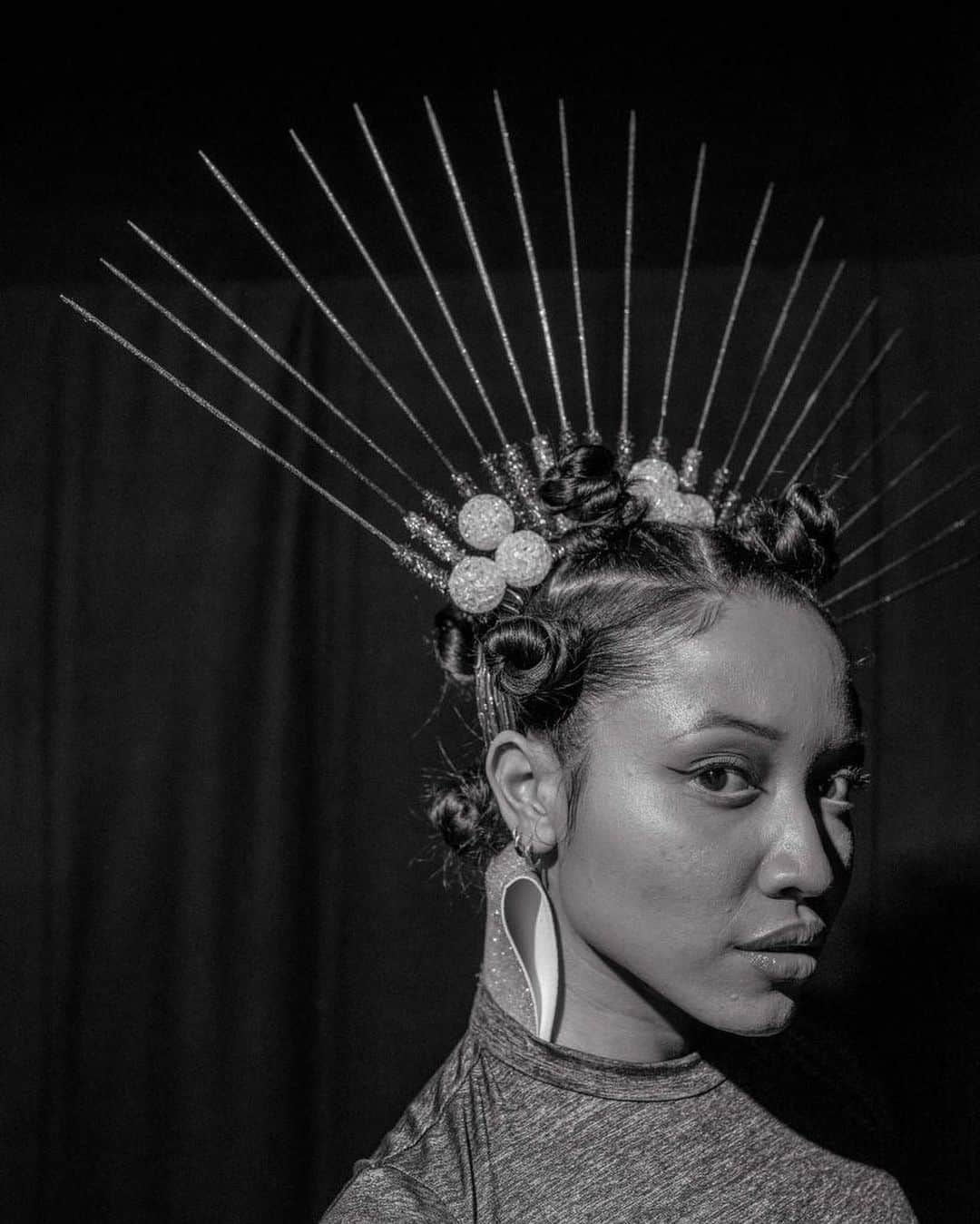 Vogue Italiaさんのインスタグラム写真 - (Vogue ItaliaInstagram)「For @DustinThierry, a contemporary artist and photographer from Curaçao whose work is focused on the Afro-Caribbean diaspora in the Netherlands, photography is an urgency, a search for a sense of belonging and a way of processing very personal issues while telling a broader story. With his series “Opulence”, dedicated to the memory of his brother, he documents the queer Afro-Caribbean Ballroom scene communities in Europe in a series of graceful black and white portraits. “Photography is the main medium in my creative practice through which I express the narratives that I feel need to be heard or that I am drawn to. The largest themes throughout my work have been representation with an undercurrent of healing. I have always been particularly intrigued by the visual theme of the family unit. These themes all intersected with the reality of the chosen families I documented at Ballroom voguing events around Europe for my Opulence series.” Read the full Q&A by @ChiaraNonino at the link in bio.」10月28日 0時29分 - vogueitalia
