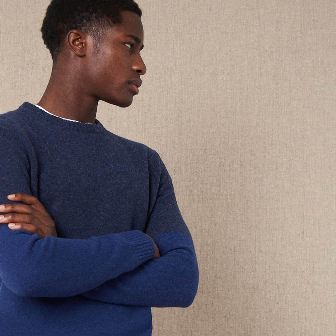 イエーガーのインスタグラム：「Your new essential layer, this mid-weight merino wool jumper is styled with a colour block design, finished with a multicolour Donegal panel and a bright blue contrast. #JaegerStyle #AW20Menswear」