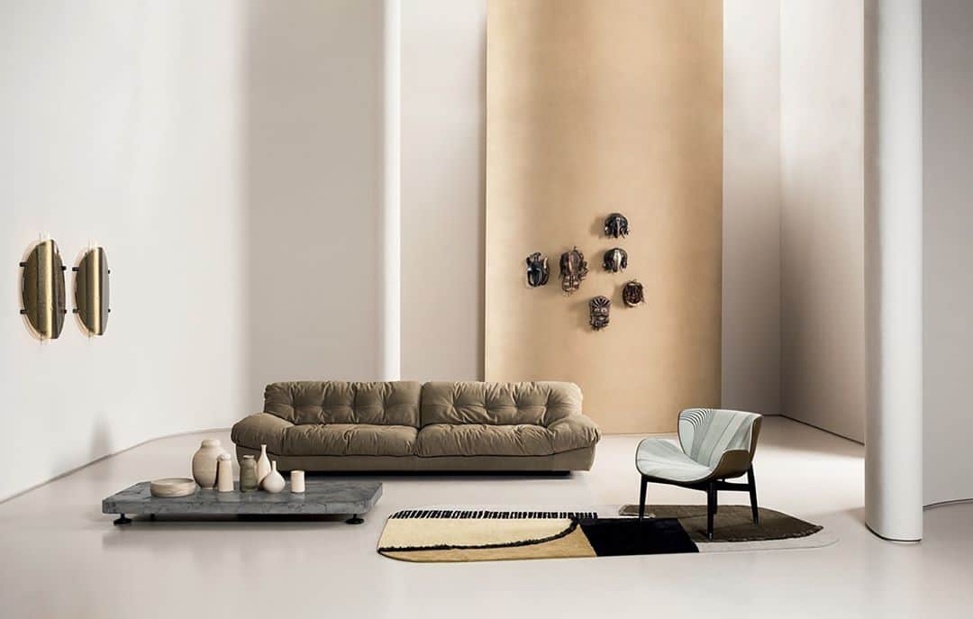 Baxterのインスタグラム：「"Always design a thing by considering it in its next larger context – a chair in a room, a room in a house, a house in an environment, an environment in a city plan"  (Eliel Saarinen)   MILANO sofa and PIOMBINO small table by @paola.navone, NANDA lamps by @studiopepe_official, JORGEN armchair by @roberto_lazzeroni, HIMANI A limited edition by Baxter P.   📷 @andreaferraristudio   #moodbook2021 #baxtermadeinitaly #baxter #newcollection #interiordesign #interior #design #furniture #2021 #leather」