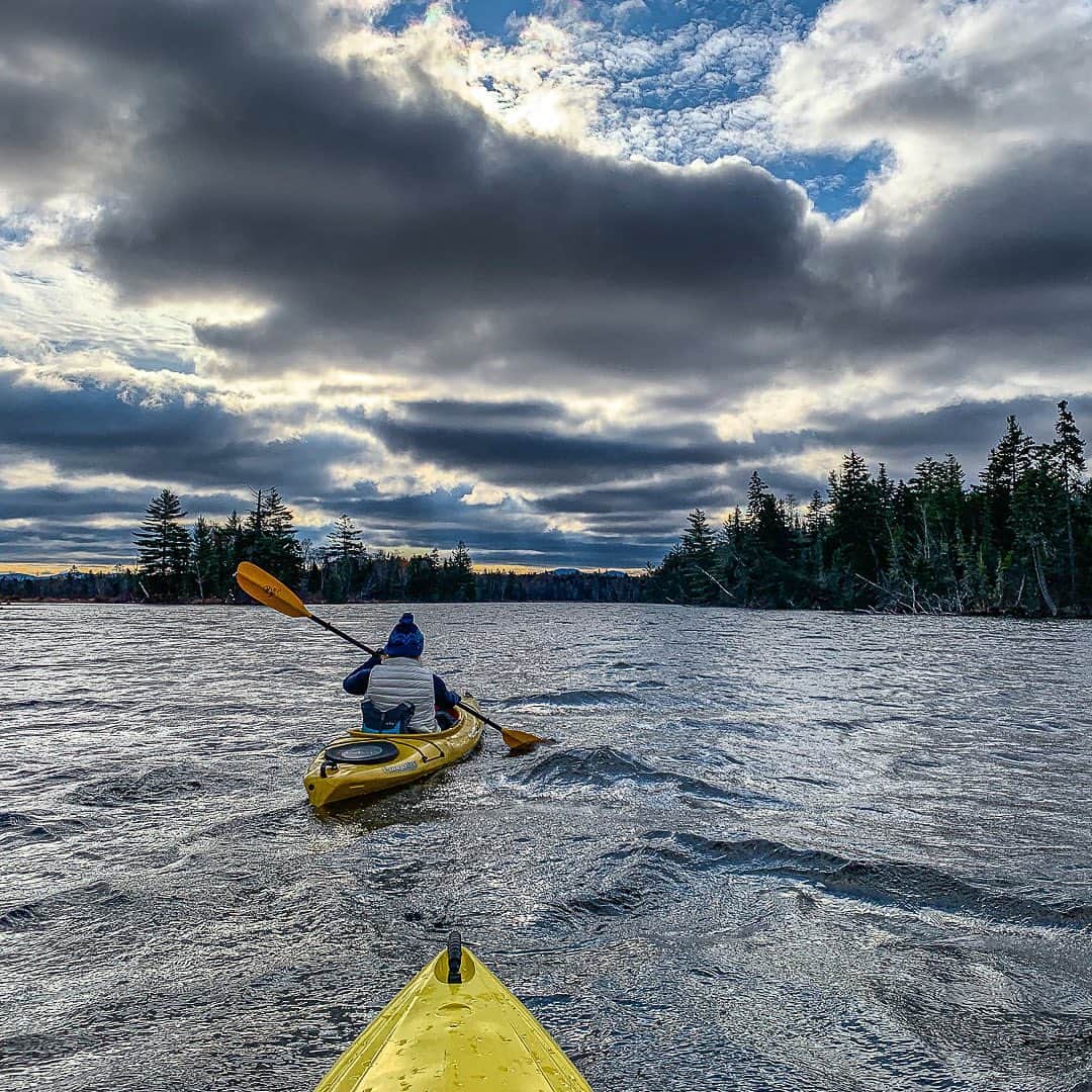 Tim Lamanさんのインスタグラム写真 - (Tim LamanInstagram)「Photo by @TimLaman.  Dramatic clouds make for some steely looking water as my daughter Jessica and I make a late fall kayak mission on the Androscoggin River in northern New Hampshire this past Sunday.  We paddled out to the spectacular Umbagog Lake, where bald eagles soared as we struggled to keep our hands warm with temps barely above freezing… but it was well worth it for the peace, beauty, and solitude.  - Join my newsletter at link in Bio to be signed up for my free print or book giveaways at the end of each month, and get more stories behind my photos. - #kayaking #kayak #NewHampshire #LakeUmbagog #NewEngland」10月28日 21時10分 - timlaman