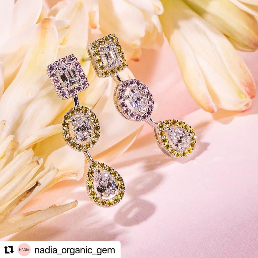 Maison de NADIA （メゾン・ド・ナディア） のインスタグラム：「#Repost @nadia_organic_gem with @make_repost ・・・ センターストーンのダイヤモンドの周囲の彩りにイエローやピンクのメレダイヤモンドを あしらったプレイフルなデザインが印象的なピアス。 エメラルド、オーバル、ペアシェイプカットのホワイトダイヤモンドを華やかに彩る、 そのアシンメトリーな配色も、 感度の高い大人の遊び心を十分に印象付けてくれます。 大好評の”パルフェ”シリーズの 待望の新作です。 ピアス￥3,3000,00（税込）  New arrival piece from popular series “ Parfait! “. A fancy shape diamond pierced earring surrounded by lovely yellow and pink small diamonds. High graded Emerald cut, Oval and Pear shape, they are all nicely polished by high-skilled diamond cutters.    #organicluxury #organic #diamond #NADIA#colourdiamond #nadiaorganicgem #madeinjapan #visitjapan #artisan #ginza #ginzashix #ダイヤモンド  #カラーダイヤモンド #オーガニック #ジュエリー #銀座 #銀座six#ピアス #ジュエリー好きな人と繋がりたい #大人可愛い #アシンメトリー」