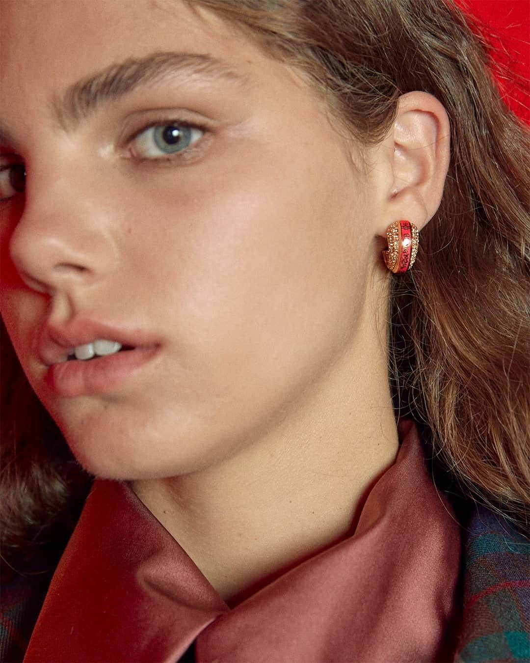 のインスタグラム：「Encrusted in sparkling crystals, the Tamela Earrings feature enamel detailing wrapped around the centre with the text reading 'Vivienne Westwood'.#VWAW20」
