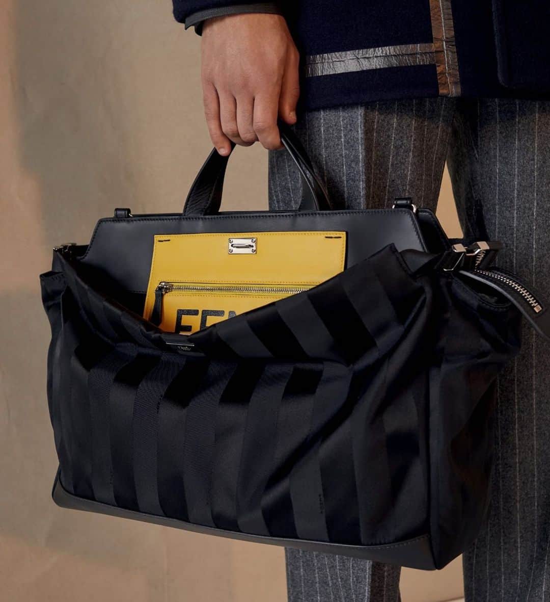 Fendiさんのインスタグラム写真 - (FendiInstagram)「A masterful fusion of construction, color, and modernity – the latest iteration of the #FendiPeekaboo bag demonstrates #Fendi’s exquisite craftsmanship and experimental ethos.  Head to the link in bio to discover more from the #FendiFW20 edit.  Photographer: @josh._.hight Stylist: @ganio Models: Noah Sapon & Jethro Sapon」10月29日 2時06分 - fendi