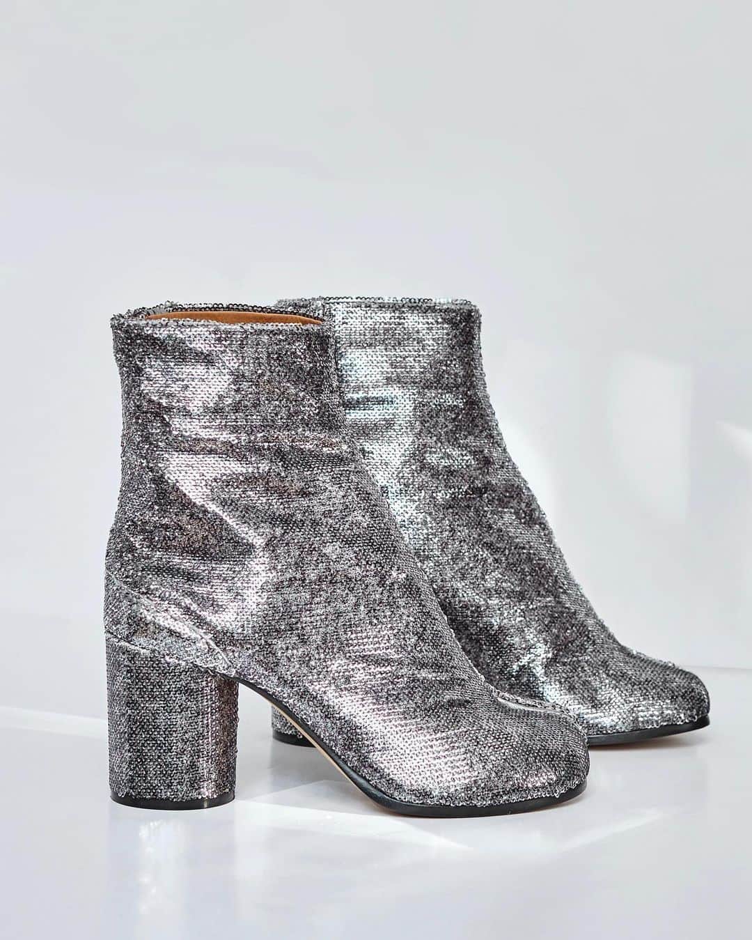 のインスタグラム：「Winter is no longer bitter sweet, now it's more 'glitter, sweet!' Of course we have @maisonmargiela to thank for this.   Shop all your favorite Instagram looks, just visit #linkinbio」