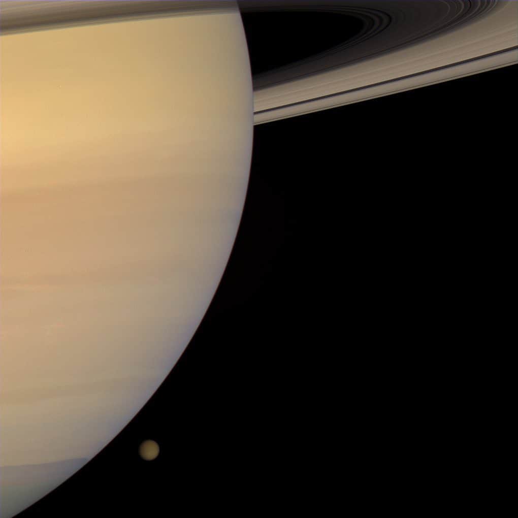 NASAさんのインスタグラム写真 - (NASAInstagram)「NASA scientists have discovered a "weird" molecule in the atmosphere of one of Saturn's moons: Titan. 🙀   Many chemists have probably barely heard of it or know how to pronounce it: cyclopropenylidene, or C3H2. Scientists say that this simple carbon-based molecule may be a precursor to more complex compounds that could form or feed possible life on Titan.  More info at the link in our bio!  Image 1: The Cassini spacecraft captured this color portrait of Saturn and Titan only a few minutes before the haze-enshrouded moon slipped behind the planet's enormous bulk. The view looks toward the sunlit side of the rings from about 5 degrees below the ringplane (photojournal PIA09856, published March 12, 2008). Credit: NASA/JPL/Space Science Institute  Image 2: Encircled in purple stratospheric haze, Saturn's largest moon, Titan, appears as a softly glowing sphere in this colorized image taken on July 3, 2004, one day after Cassini's first flyby of that moon. Titan has a dense atmosphere composed primarily of nitrogen with a few percent methane. The atmosphere can undergo photochemical processes to form hazes. Credit: NASA/JPL/Space Science Institute  Image 3: This infrared image of Saturn's moon Titan represents one of the clearest global views of the icy moon's surface. The view was created using years of data acquired by the Visual and Infrared Mapping Spectrometer instrument aboard NASA's Cassini spacecraft. Credit: NASA/JPL-Caltech/University of Nantes/University of Arizona」10月29日 8時47分 - nasagoddard