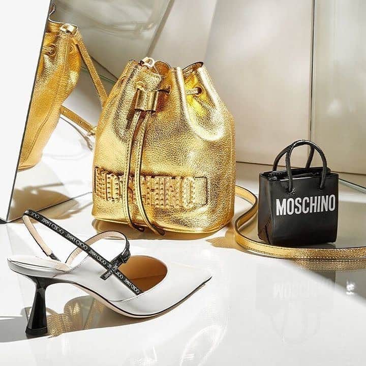 のインスタグラム：「You just struck gold. #Moschino, #JimmyChoo, and more head-turning styles are here. Tap to shop.」