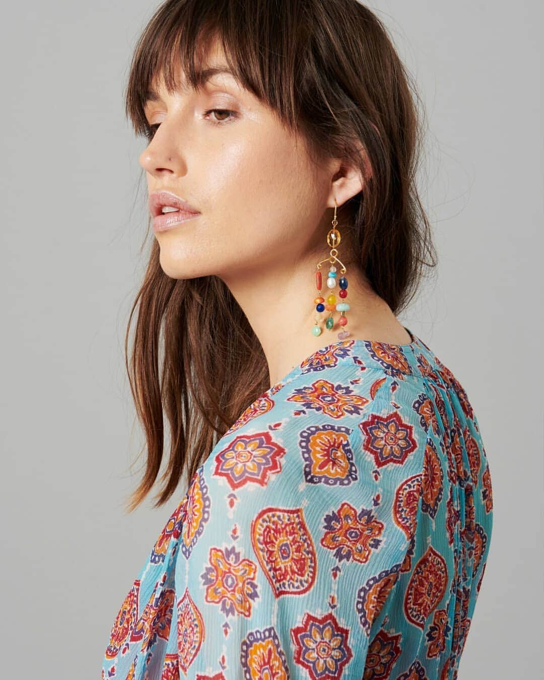 ミーガンパークのインスタグラム：「NEW IN! // make a playful statement in the new Talitha Gala Earrings, featuring intricate chandeliers combining an electric mix of multi-coloured, semi-precious stones and freshwater pearls. Find them IN STORE & online now x」