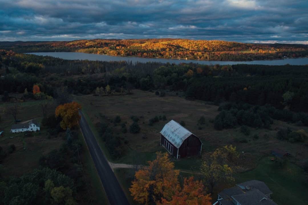 National Geographic Travelさんのインスタグラム写真 - (National Geographic TravelInstagram)「Photo by Spencer Millsap @Spono / The last low fall sun of the day caresses a nearby hillside in rural northern Michigan. The fall colors and small towns are nothing short of stunning along the western coastline as you make your way north to the Mackinac Bridge, which separates the lower and upper peninsulas of the state. #Michigan #Mackinac」10月30日 11時34分 - natgeotravel