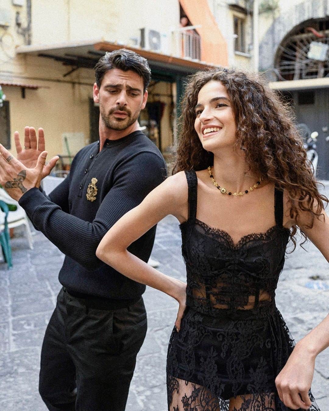 ドルチェ&ガッバーナさんのインスタグラム写真 - (ドルチェ&ガッバーナInstagram)「Stories from Napoli, Italia. Chiara wears an elegant black lace dress.  Michele wears a black long-sleeve shirt with a patch and black pants.    Shop the #DGFW20 look at the link in bio.    Shot by @ciropipoli     #DolceGabbana #DGLovesNapoli #MadeInItaly🇮🇹」10月7日 6時58分 - dolcegabbana