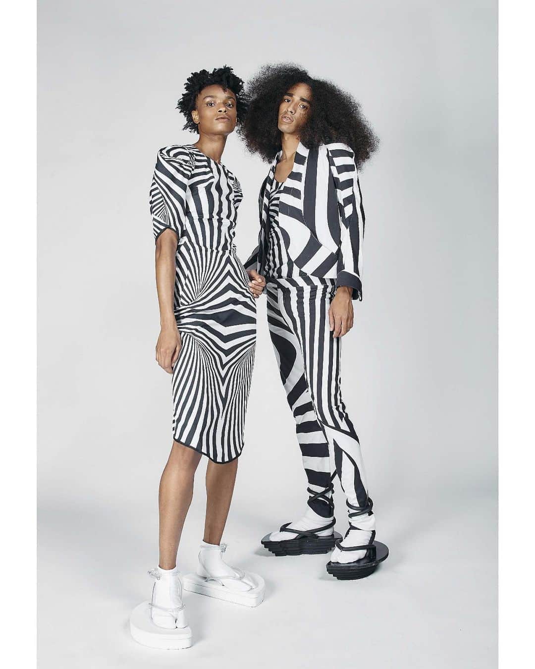 スリーアズフォーのインスタグラム：「Our New collection “Vesica Piscis” is out on @voguerunway  Photographer : Elisabet Davids @elisabet_davidsdottir @elisabetd  Model: Kayla Scott , @complete_clarity , Joseph Gelpi @chicojoseph at Ford Models  @fordmodels  Stylist : Victoria Bartlett @victoria_bartlett_nyc  Hair: Kenta Koda @kenta.koda  Makeup: Chichi Saito @chichisaito  Prints in collaboration with Mimaki  @mimakiusa @mimakiusa_textile and @brittshaked #threeasfour @threeasfour」