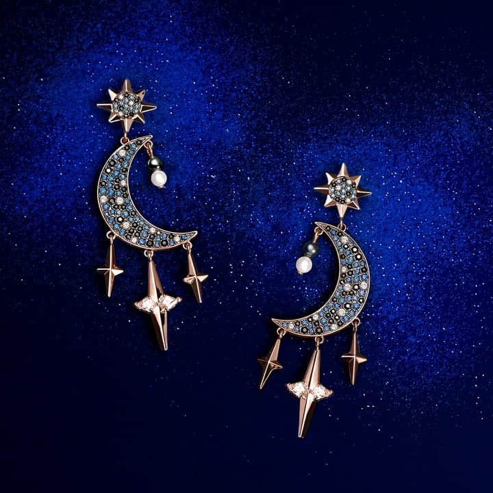 のインスタグラム：「Inspired by the beauty of the night sky, Swarovski Symbolic Collection earrings feature mesmerising moon and star motifs #Swarovski125years」