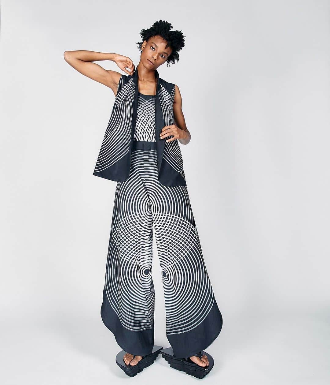 スリーアズフォーのインスタグラム：「Our New collection “Vesica Piscis” is out on @voguerunway  Photographer : Elisabet Davids @elisabet_davidsdottir @elisabetd  Model: @complete_clarity at Ford Models  @fordmodels  Stylist : Victoria Bartlett @victoria_bartlett_nyc  Hair: Kenta Koda @kenta.koda  Makeup: Chichi Saito @chichisaito  Prints in collaboration with Mimaki  @mimakiusa @mimakiusa_textile @brittshaked @threeasfour #threeasfour #vesicapiscis」