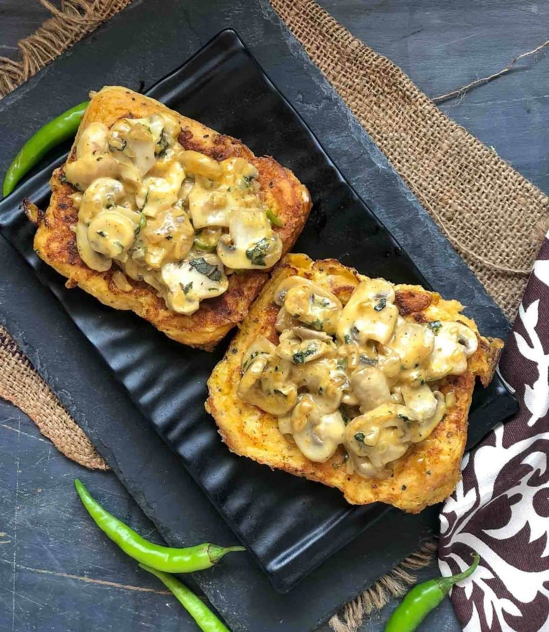 Archana's Kitchenさんのインスタグラム写真 - (Archana's KitchenInstagram)「If you love French Toast for breakfast then this savory toast topped with achari mushroom is a must try. The mushrooms are tossed in a creamy Achari Mayo and topped over a Garlic & Oregano French Toast giving it the perfect taste to the palate. Serve it along with a cup of coffee or even a glass of orange juice for a refreshing and wholesome breakfast. Get the recipe from the smart.bio link in my profile @archanaskitchen . . . . . . #recipes #easyrecipes #breakfast #Indianbreakfast #archanaskitchen #healthyeating #highprotein #breakfastclub #dosa #dosarecipes #dosabatter #ragi #ragidosa #mysoremasaladosa #homemadefood #eatfit #cooking #food #healthyrecipes #foodphotography #recipeoftheday #comfortfood #deliciousfood #delicious #instayum #food」10月9日 11時30分 - archanaskitchen