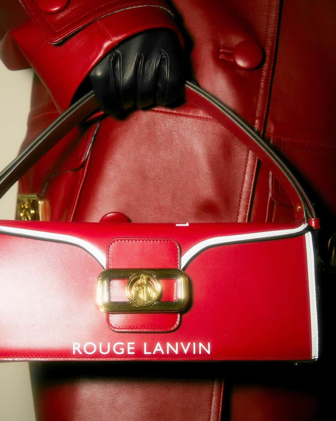 ランバンのインスタグラム：「“Rouge Lanvin“ Pencil bag refers to the red shade of the vintage #LANVIN lipsticks. The “Cosmetics” capsule collection is inspired by LANVIN beauty archives from the 1930s.  Discover a series of collector’s pieces. Available in stores. #LanvinBags  #LanvinFW20」