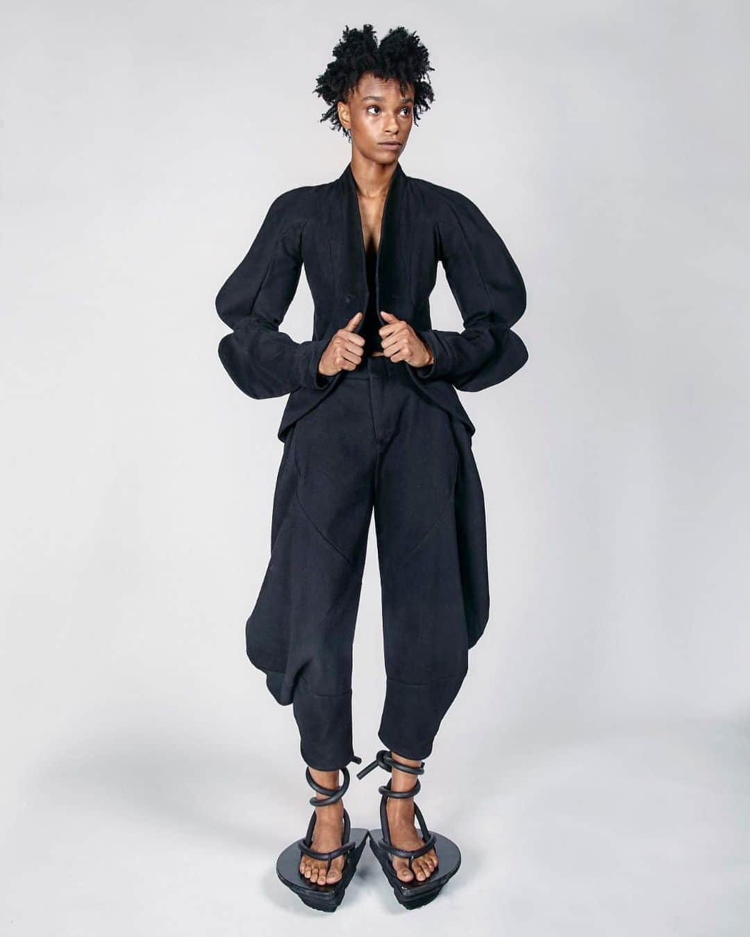 スリーアズフォーのインスタグラム：「Our New collection “Vesica Piscis” is out on @voguerunway  Photographer : Elisabet Davids @elisabet_davidsdottir @elisabetd  Model: @complete_clarity at Ford Models  @fordmodels  Stylist : Victoria Bartlett @victoria_bartlett_nyc  Hair: Kenta Koda @kenta.koda  Makeup: Chichi Saito @chichisaito #vesicapiscis」