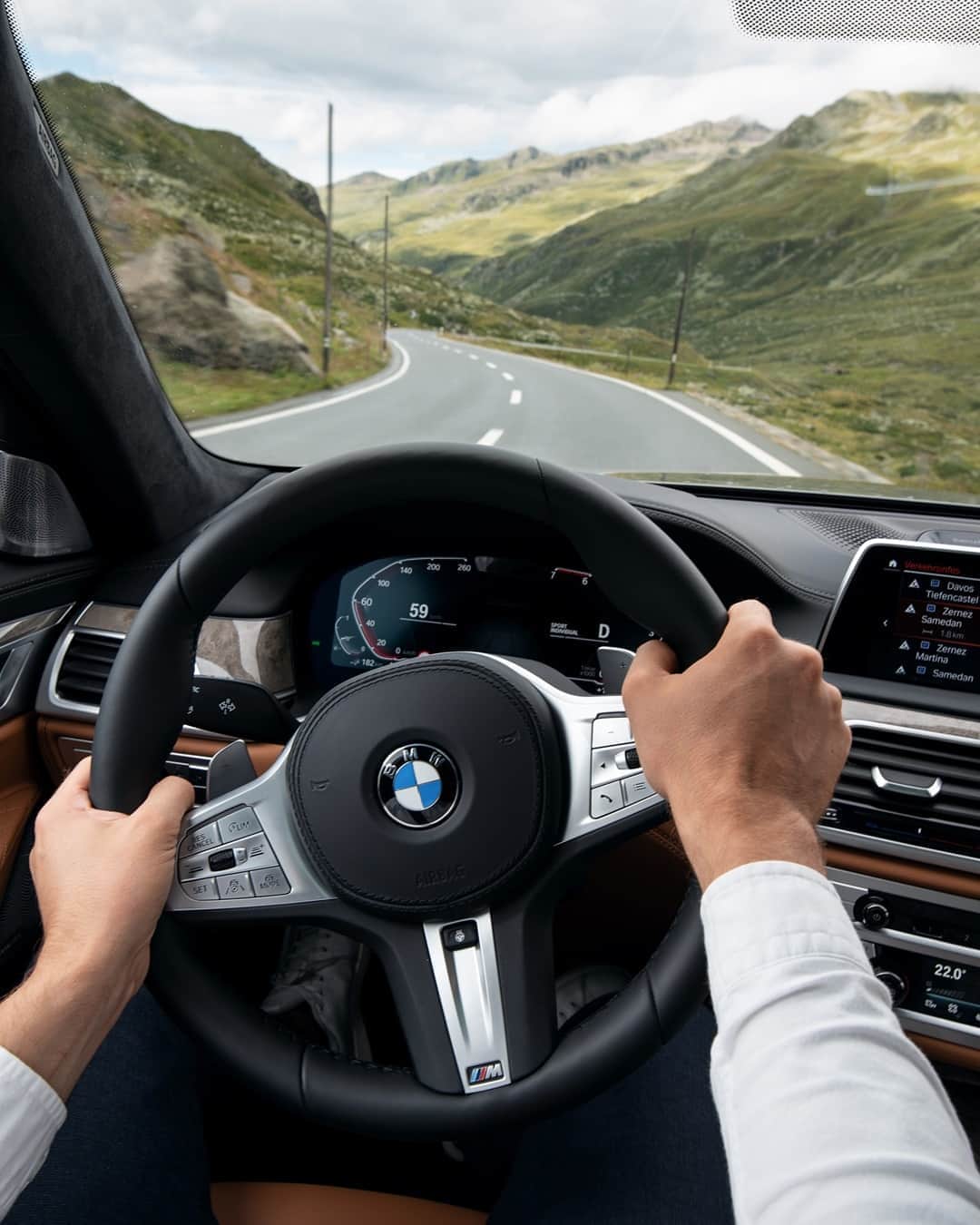BMWのインスタグラム：「Once you hit the road, you'll never want to turn back. The BMW 7 Series Sedan. #THE7 #BMW #7Series #BMWrepost @lumafoto __ BMW 745e Sedan: Energy consumption in kWh/100 km (combined): 15.5–15.1. Fuel consumption in l/100 km (combined): 2.2–2.1. CO2 emissions in g/km (combined): 51–48. Further information: www.bmw.com/disclaimer.  Acceleration (0-100 km/h): 5.2 s. Power: 290 kW, 394 hp, 600 Nm. Top speed (limited): 250 km/h.」