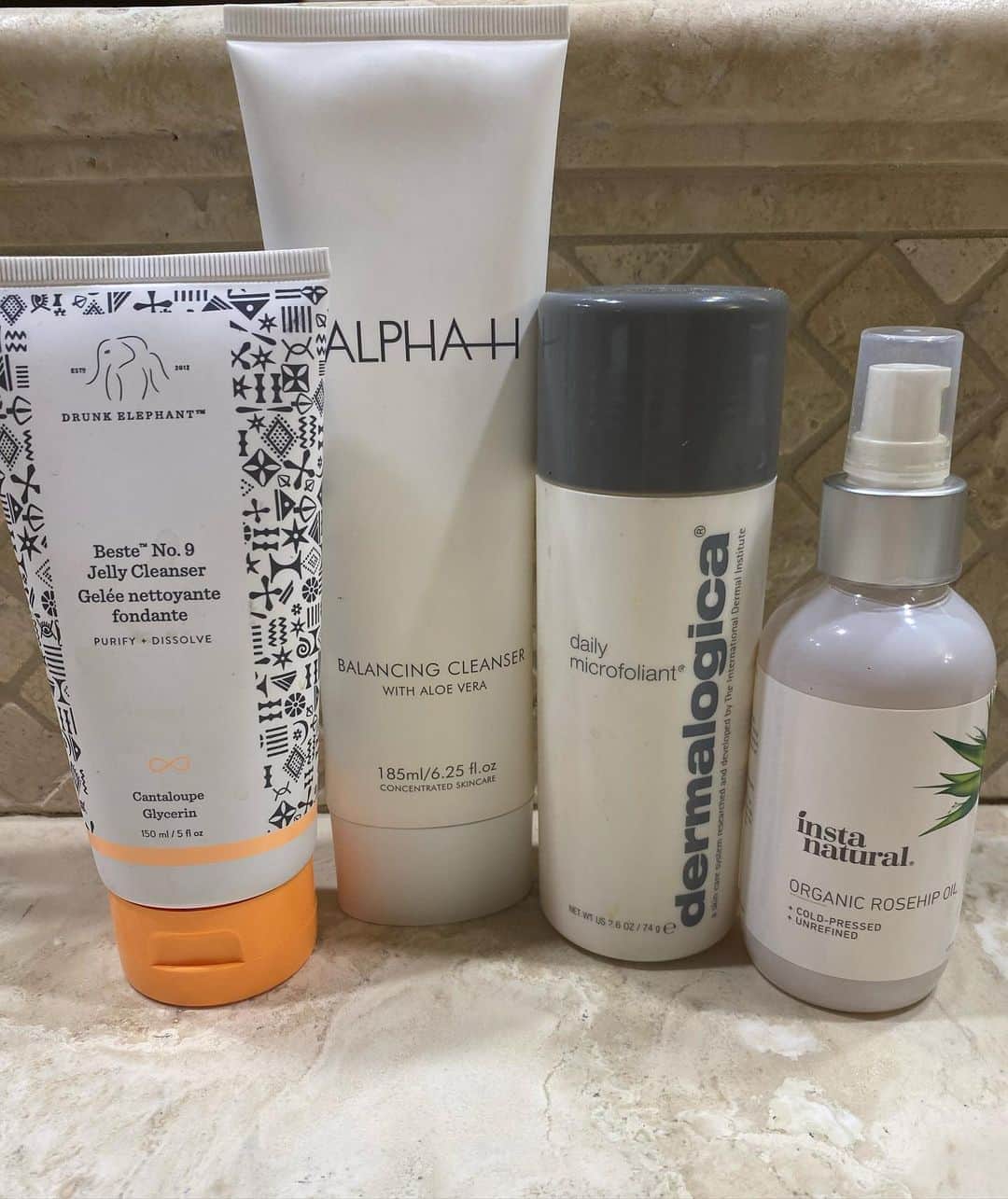ミラ・ジョヴォヴィッチさんのインスタグラム写真 - (ミラ・ジョヴォヴィッチInstagram)「CLEANSER!😆And trust me, some days I really need it! This was last year after a crazy shoot, but pic 2 and 3 are from today where I took my make up off. Thanks to @chrissbrenner for all the photos! So obviously cleansing is IMPORTANT.😂If I had the time (and I know a lot of women would agree with me) I would cleanse my face halfway through the day and just do my skincare and make up all over again. That’s how important it is. I’ve literally done photo shoots where the make up artist has me wash ALL my make up off so they can reapply everything on freshly washed, hydrated skin. Of course none of us can do this in real life, but I just wanted to stress how important your cleanser is. I use face washes that are ph balanced. I took a pic of mine, but you can google ph balanced cleanser and there’s loads of articles on different kinds. The importance of ph balance is huge. I used a lathery, expensive cleanser for many years and my skin got all these tiny under skin bumps that I had no clue how to get rid of. One doctor even told me to take antibiotics for them! I then read about cleansing my face with rosehip oil and ph balanced cleansers. They made ALL THE DIFFERENCE. They don’t strip your skin of it’s natural oils. And it seems weird but using a cleanser that cleans every bit of oil off your skin makes your skin MORE oily. And that’s what gave me those little bumps. My skin was OVER producing sebum because I was cleansing TOO MUCH. I also like to use the rose hip oil as a morning cleanser. Because I cleanse every evening to get all make up and daily grime off my face, I don’t want to use anything too strong in the morning. Rose hip is one of the only facial oils that doesn’t block your pores AT ALL. It’s incredible gentle and prepares my skin for the day ahead. I don’t use it every morning, but like 2-3 times a week. When I use it, I’ll follow with a ph balanced toner. I didn’t post a pic of these, but again google it and you’ll find many products that are great as long as they say “ph balanced” on them. Products tagged in pic2 #millaskin #notanad」10月11日 14時29分 - millajovovich