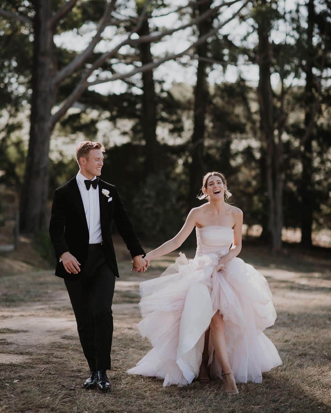 Vogue Australiaさんのインスタグラム写真 - (Vogue AustraliaInstagram)「Would you wear pink on your wedding day? When Sarah Haag wed her husband, Tom, she chose a dusty pink tulle gown that was anything but traditional. “I wanted something either super simple or really dramatic, that wasn’t necessarily white,” shared Sarah of her unique @toni_maticevski wedding dress. “It was perfect and definitely dramatic. I changed into a long ivory silk slip later that evening.” Link in bio for more from this fun-filled Victorian countryside wedding. 📷 @tessfollett」10月11日 18時15分 - vogueaustralia