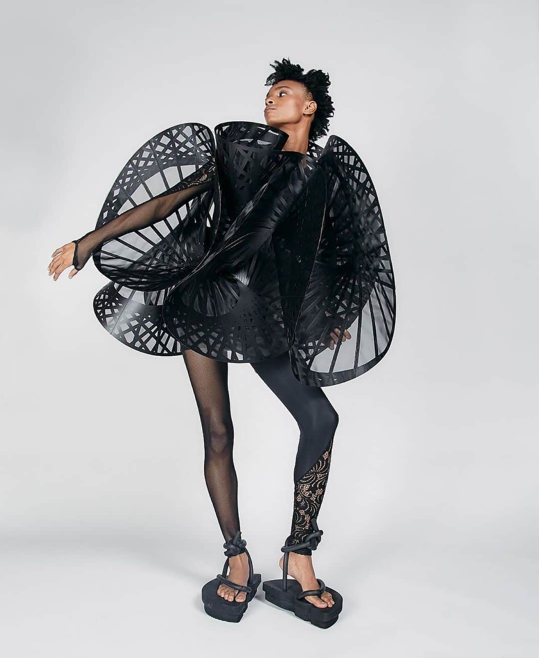 スリーアズフォーのインスタグラム：「Our New collection “Vesica Piscis” is out on @voguerunway  Photographer : Elisabet Davids @elisabet_davidsdottir @elisabetd  Model: @complete_clarity at Ford Models  @fordmodels  Stylist : Victoria Bartlett @victoria_bartlett_nyc  Hair: Kenta Koda @kenta.koda  Makeup: Chichi Saito @chichisaito #vesicapiscis」