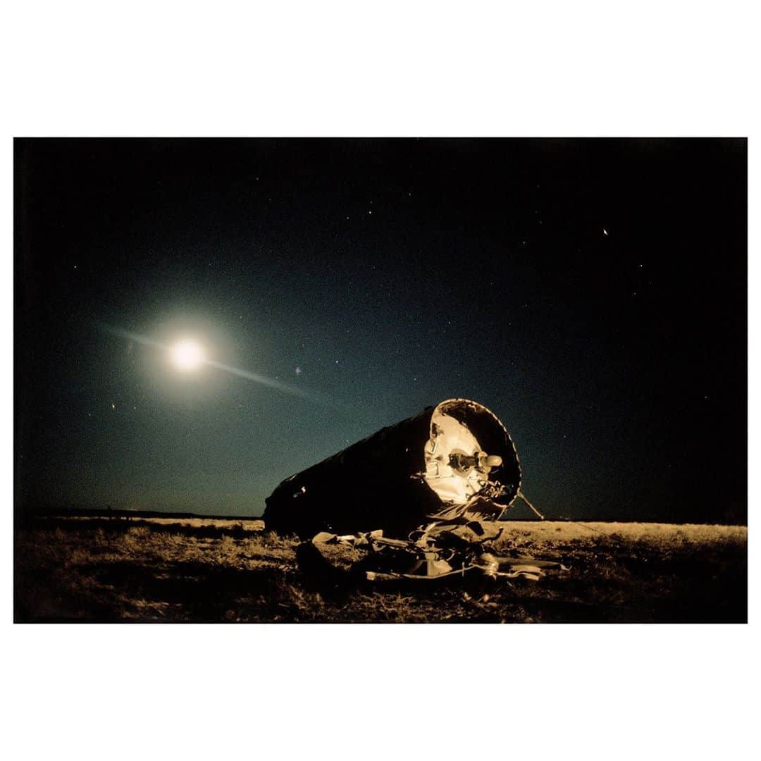 Magnum Photosさんのインスタグラム写真 - (Magnum PhotosInstagram)「In Kazakhstan, @jonasbendiksen captured the land and people living under flight paths of Russian rockets. Pictured here, a Soyuz rocket fuel tank, 2000.⁠ .⁠ Space rockets consist mainly of fuel tanks and booster engine stages that never reach orbit, falling back to earth when spent. Due to the land-locked location of Baikonur, Russia’s biggest launching complex in Kazakhstan, rockets do not reach the ocean before they come crashing down, often falling into populated areas. ⁠ .⁠ This photograph by @jonasbendiksen is now available as a limited edition signed fine print on the Magnum Shop.⁠ .⁠ Explore the collection at the link in bio.⁠ .⁠ PHOTO: A Soyuz rocket fuel tank lies on the steppe. Kazakhstan, 2000.⁠ .⁠ © @jonasbendiksen/#MagnumPhotos」10月13日 19時02分 - magnumphotos