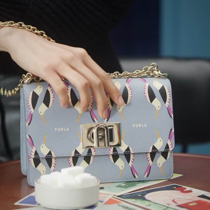 フルラのインスタグラム：「Appreciate those everyday restful moments with the Furla 1927 Mini Crossbody.  Creative Direction: Magnus Berger & Tenzin Wild @thelast_universe Photographer Director: @giampaolosgura Stylist: @sissy.vian Hair Stylist: @francogobbi1 Make up: @cosettagiorgetti  #thefurlasociety #furlafeeling #newcollection #furla #accessories #fashion」