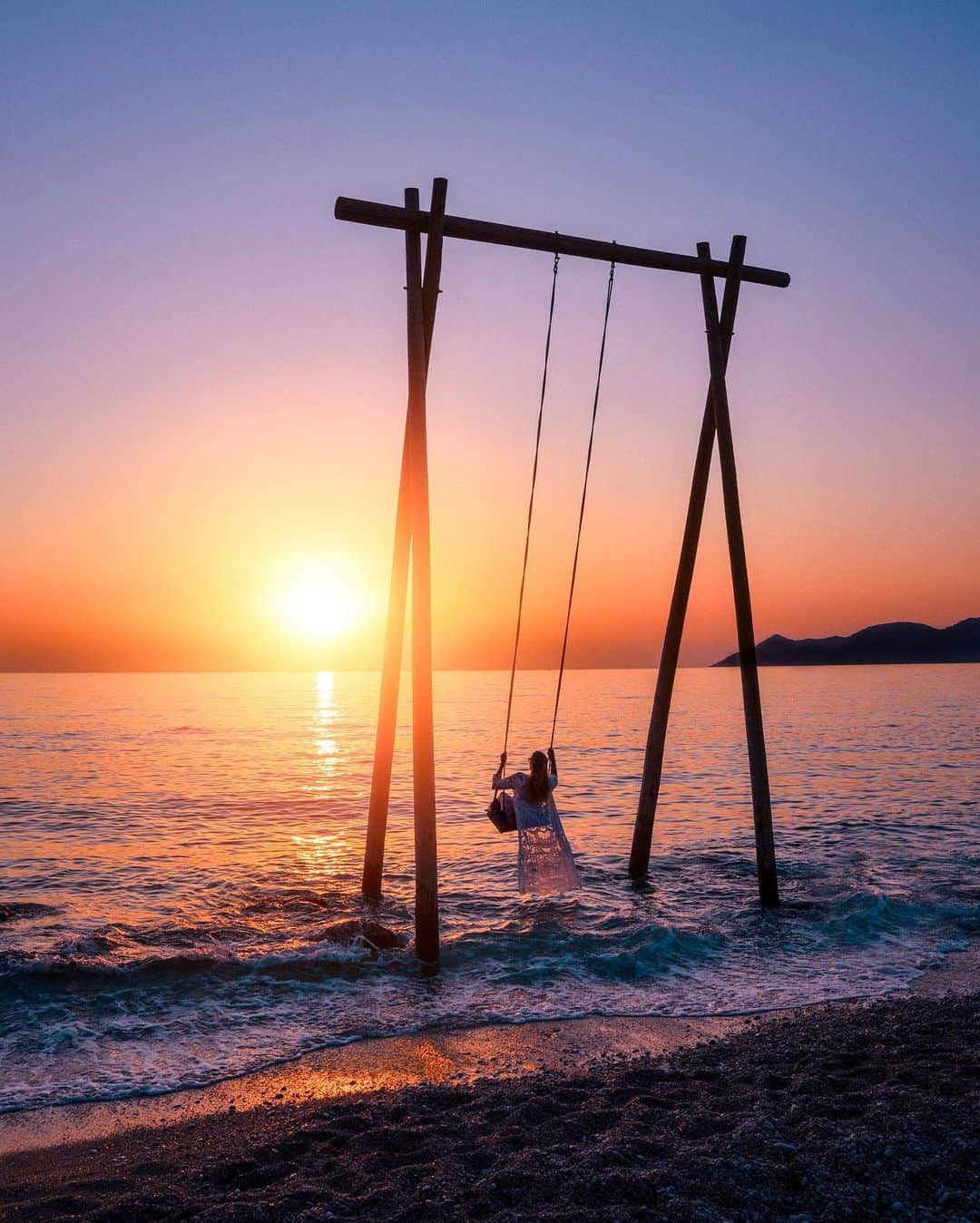 Izkizのインスタグラム：「Sunset swinging at @libertyhotelslykia - a lovely hotel nestled between the mountains and the sea in Ölüdeniz, Turkey. 💛」