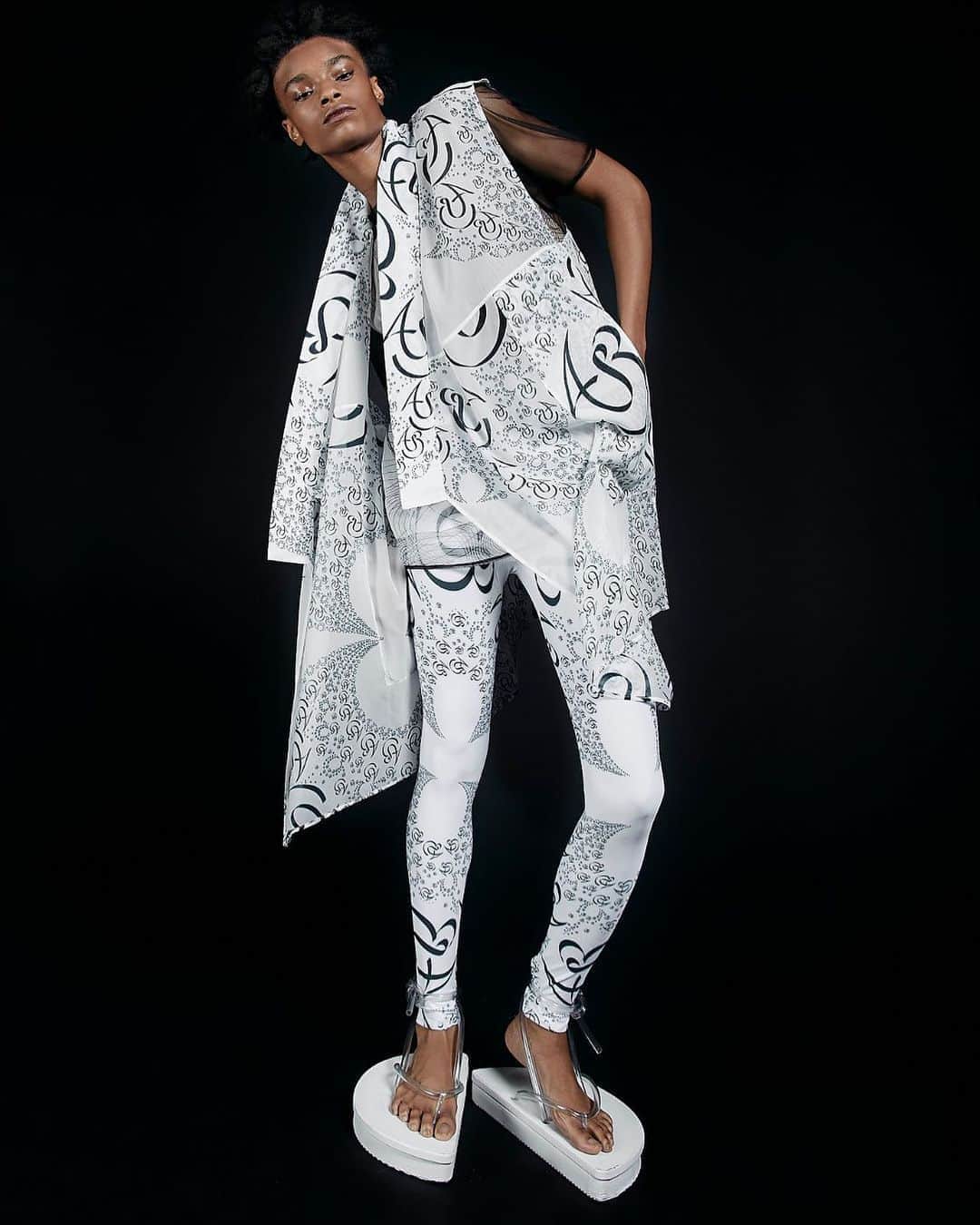 スリーアズフォーのインスタグラム：「Our New collection “Vesica Piscis” is out on @voguerunway  Photographer : Elisabet Davids @elisabet_davidsdottir @elisabetd  Model: @complete_clarity at Ford Models  @fordmodels  Stylist : Victoria Bartlett @victoria_bartlett_nyc  Hair: Kenta Koda @kenta.koda  Makeup: Chichi Saito @chichisaito  Prints in collaboration with Mimaki  @mimakiusa @mimakiusa_textile  @threeasfour #threeasfour #vesicapiscis」