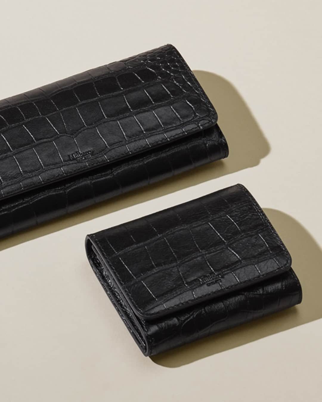 のインスタグラム：「The Continental collection showcases wallets and purses in classic Black Croc.」